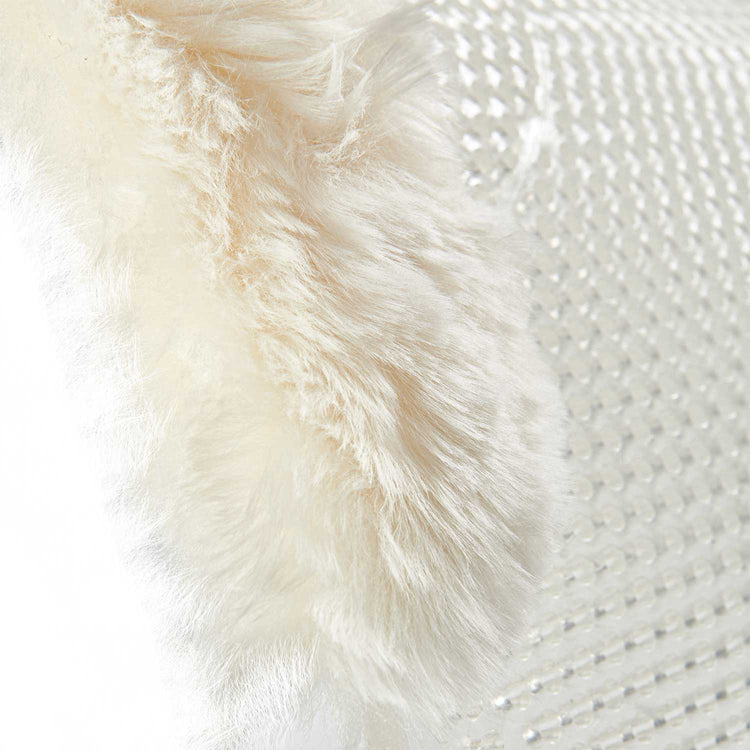 Close-up of a textured white fabric with fluffy surface