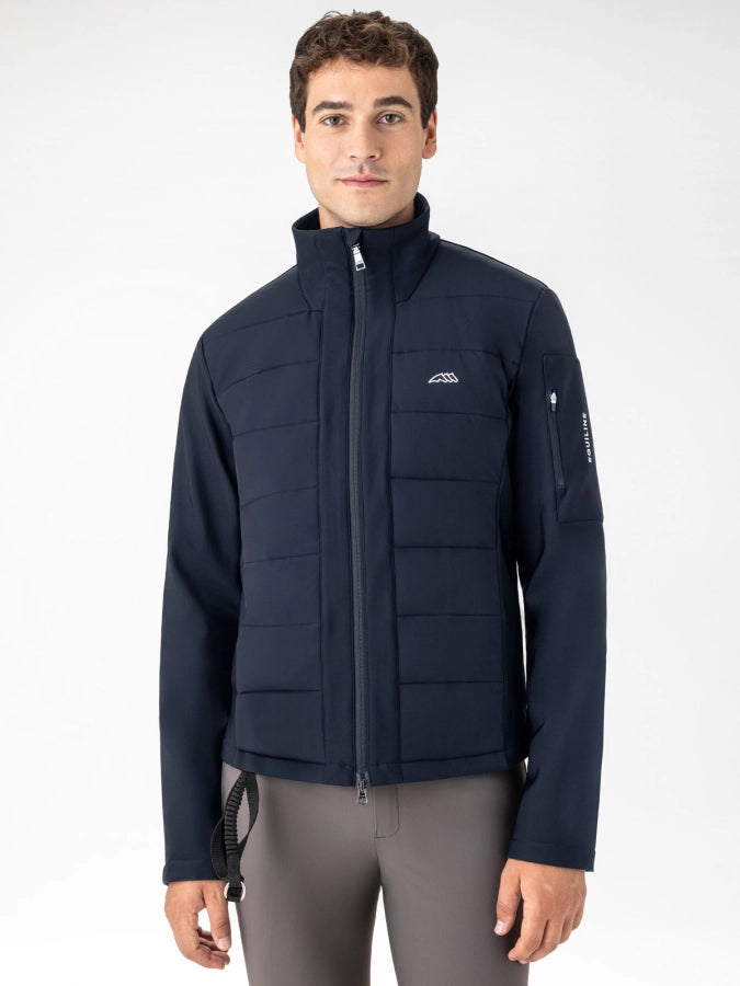 Man wearing a navy softshell jacket with Equiline branding