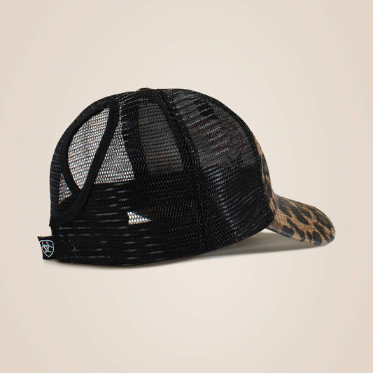 Black mesh cap with leopard print brim on a beige background