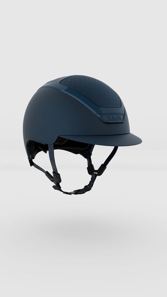 Dark blue riding helmet on a light gray background