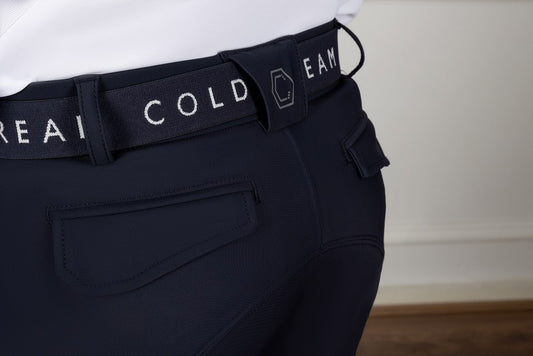 Navy pants with a belt displaying 'COLDSTREAM' on a neutral background
