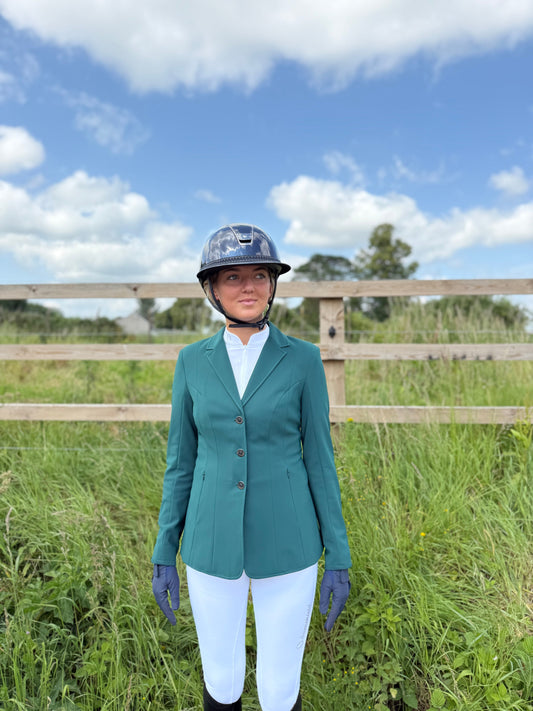 green samshield jacket with model wearing navy samshield gloves and navy samshield helmet