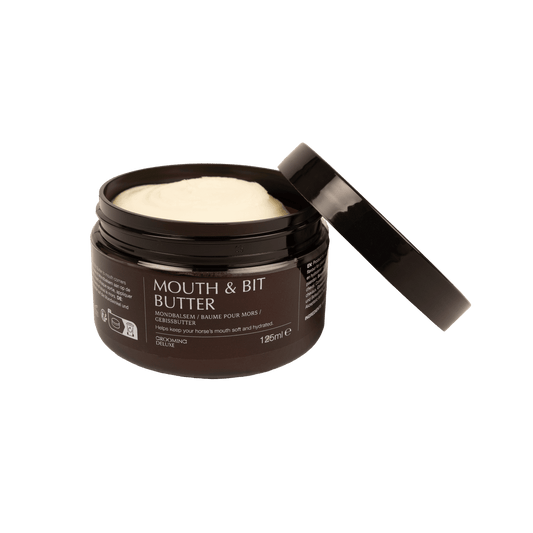 A dark brown jar of Mouth & Bit Butter with its lid off, showing a pale cream-colored balm inside, on a solid white background.