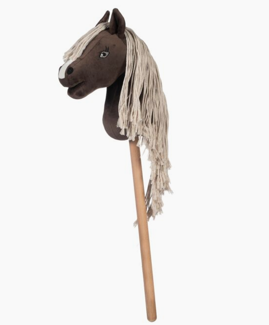 Horse head with a long mane on a wooden stick against a white background