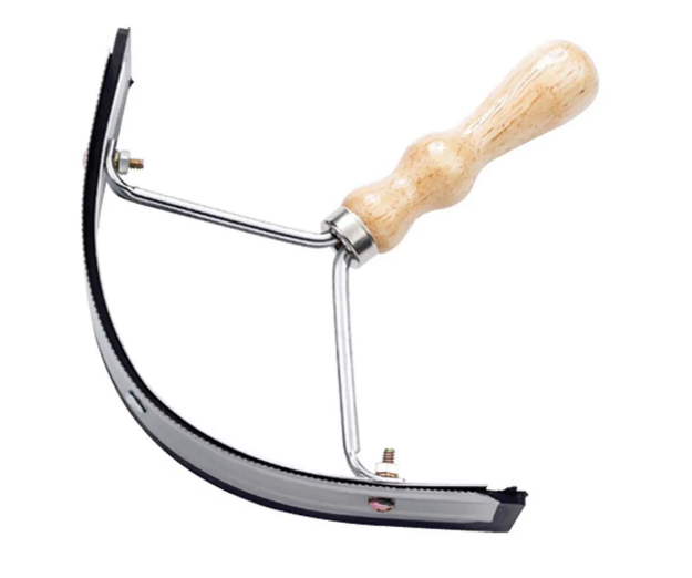 Wooden-handled sweat scraper on white background