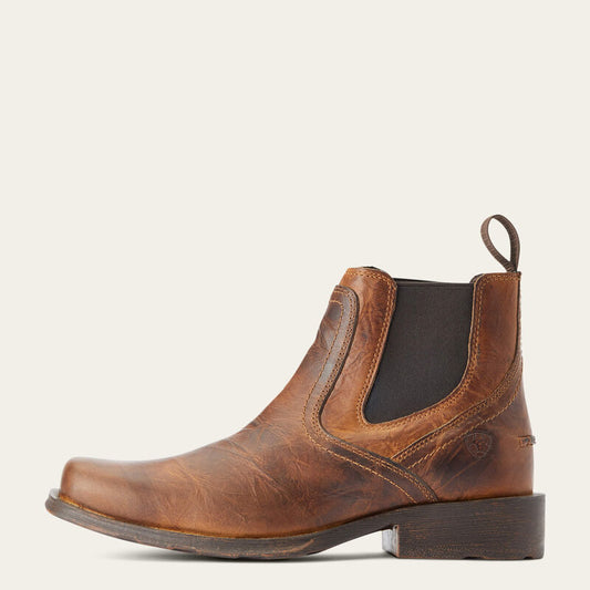 Brown leather boot with a white background