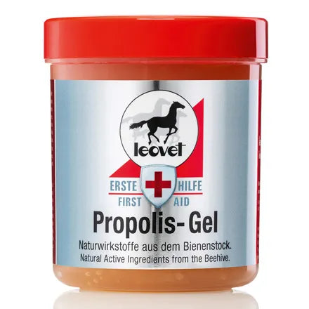 A jar of Leovet Propolis Gel with a red lid and a silver label, shown on a white background with a soft reflection.
