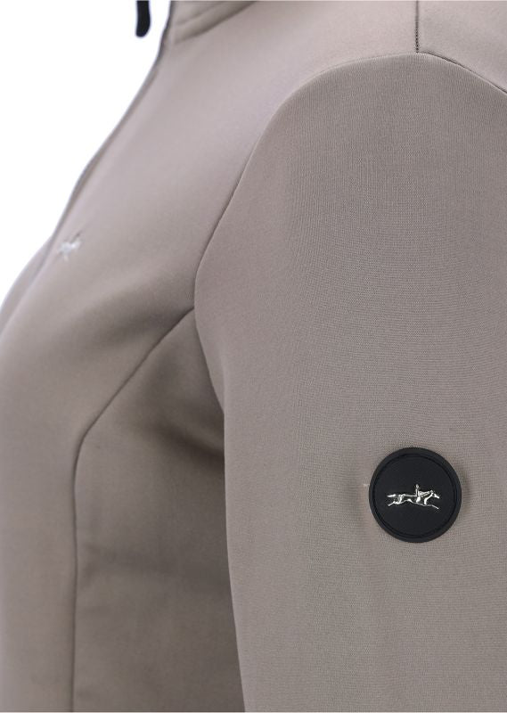 Sleeve of a light brown sweat jacket with rubber horse logo on a white background