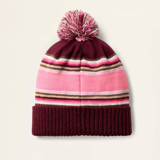 Pink beanie on a beige background