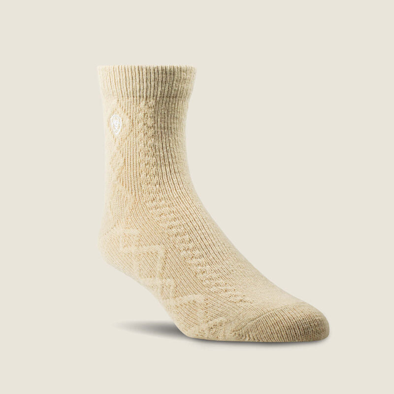 Beige sock on a beige background