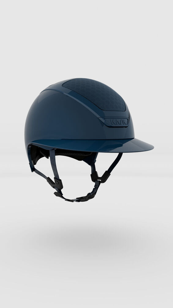 Navy riding helmet on a white background