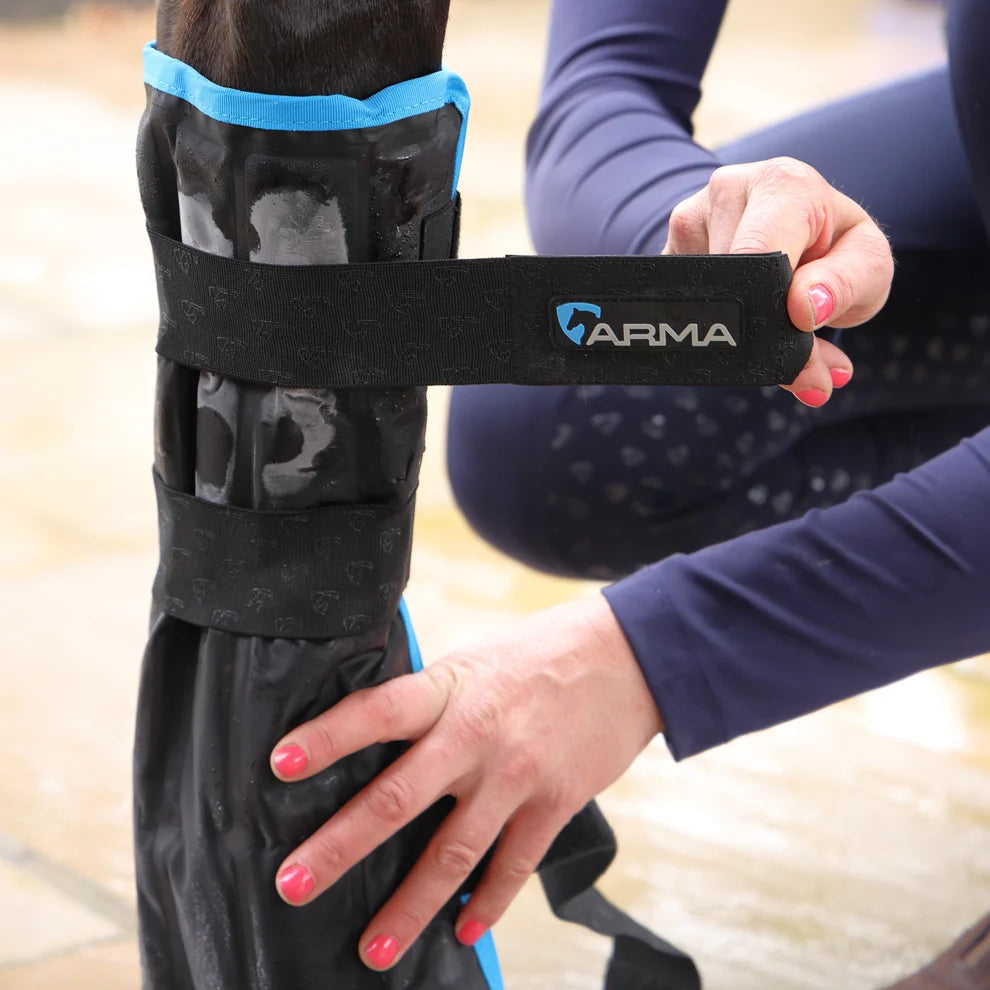Person applying an ARMA bandage to a horse's leg