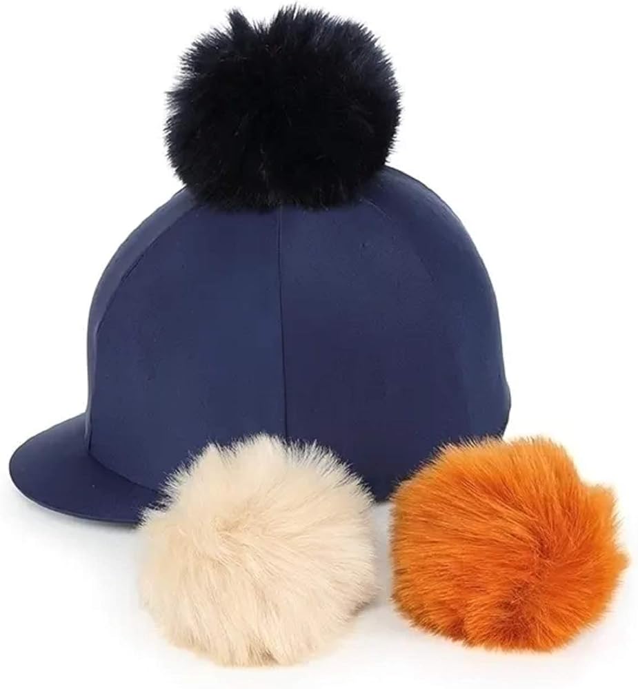 Navy blue helmet with black, beige, and orange fur pom-poms on a white background