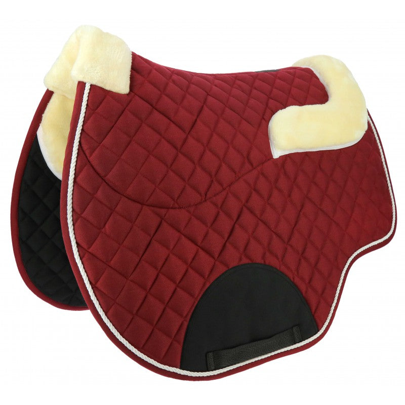 Burgundy saddle pad with sheepskin lining on a white background