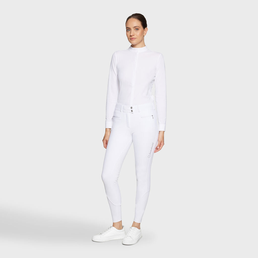 lady wearing white competition breeches