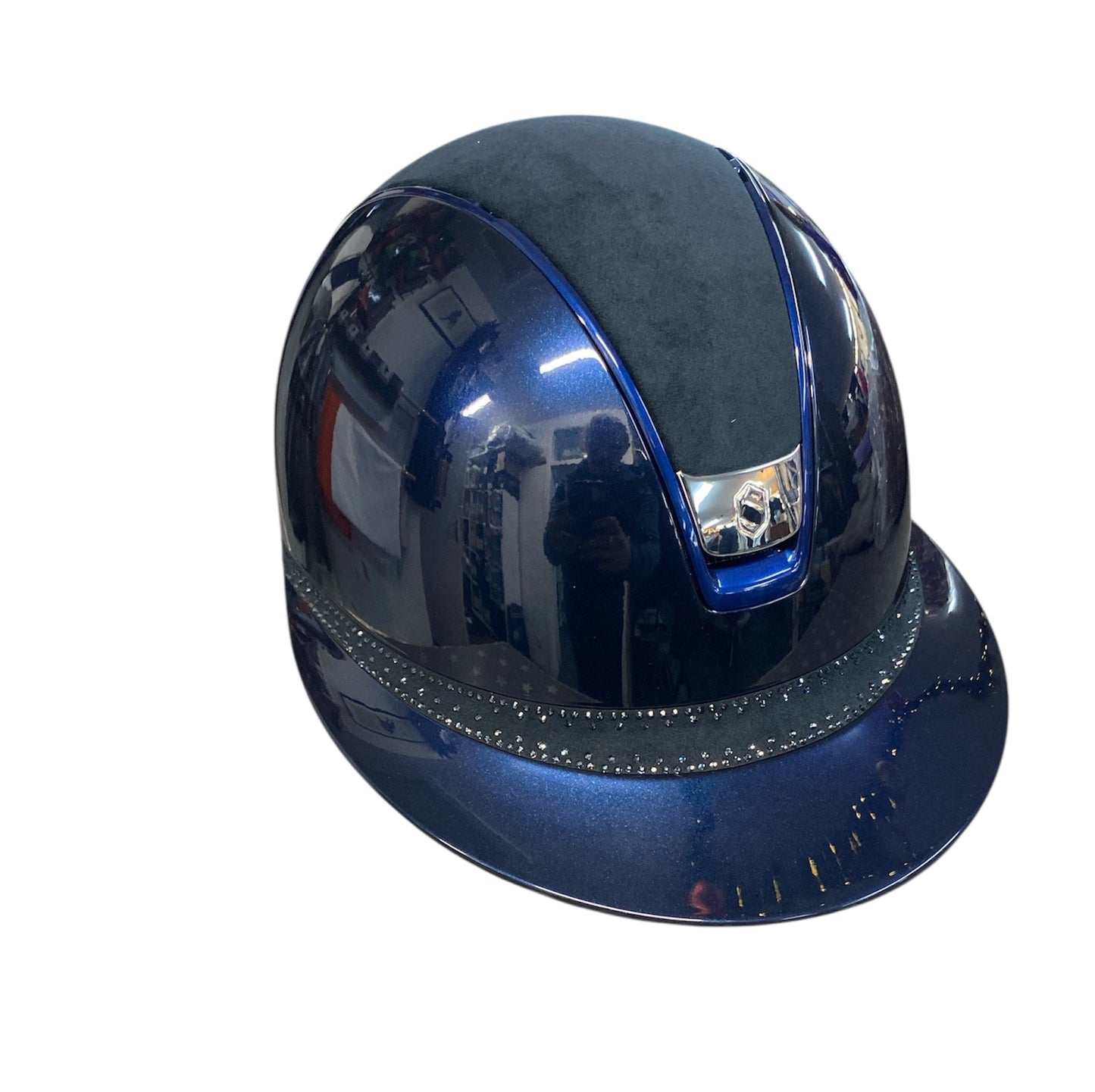 Blue hard hat with reflective surface on a white background