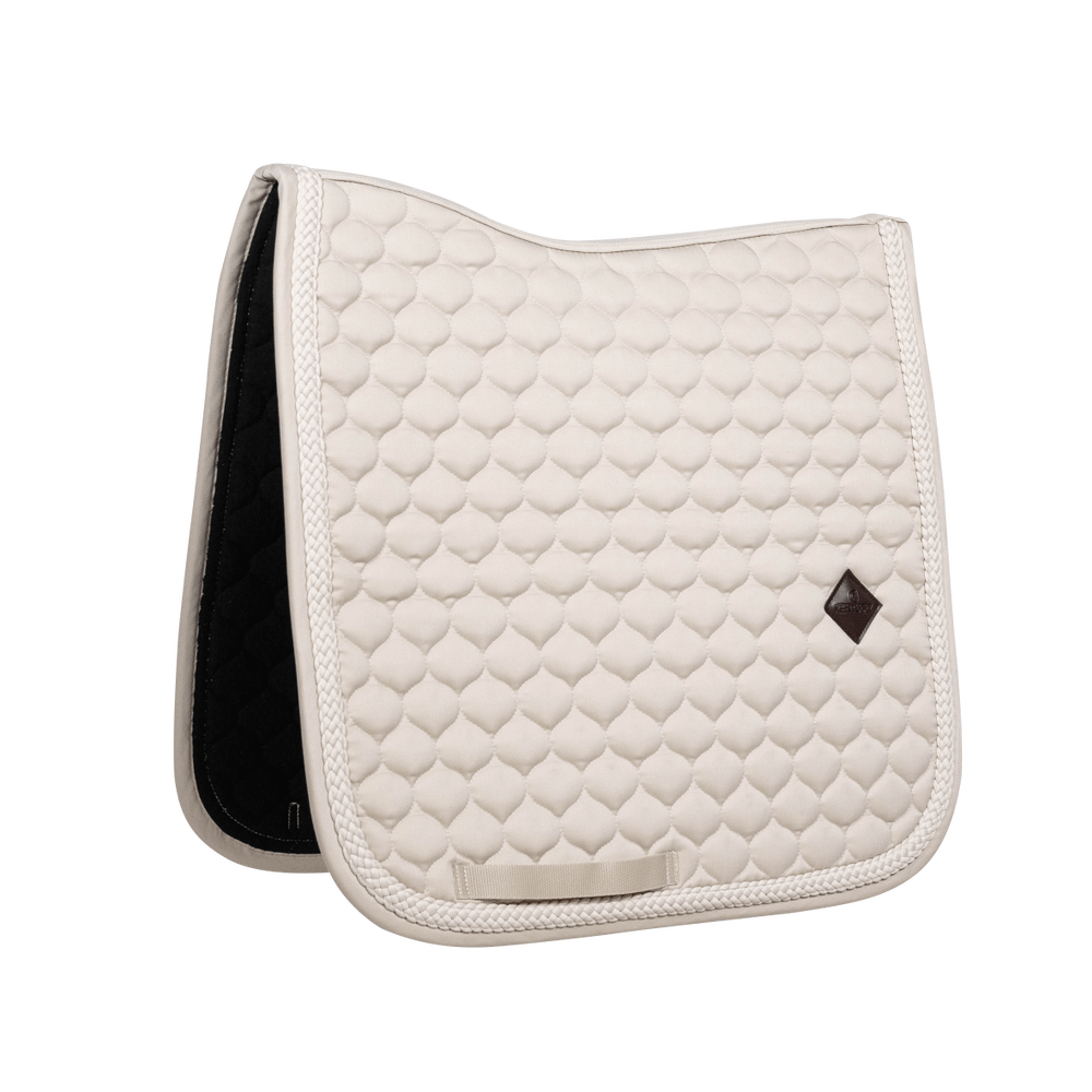 Beige saddlepad on a white background
