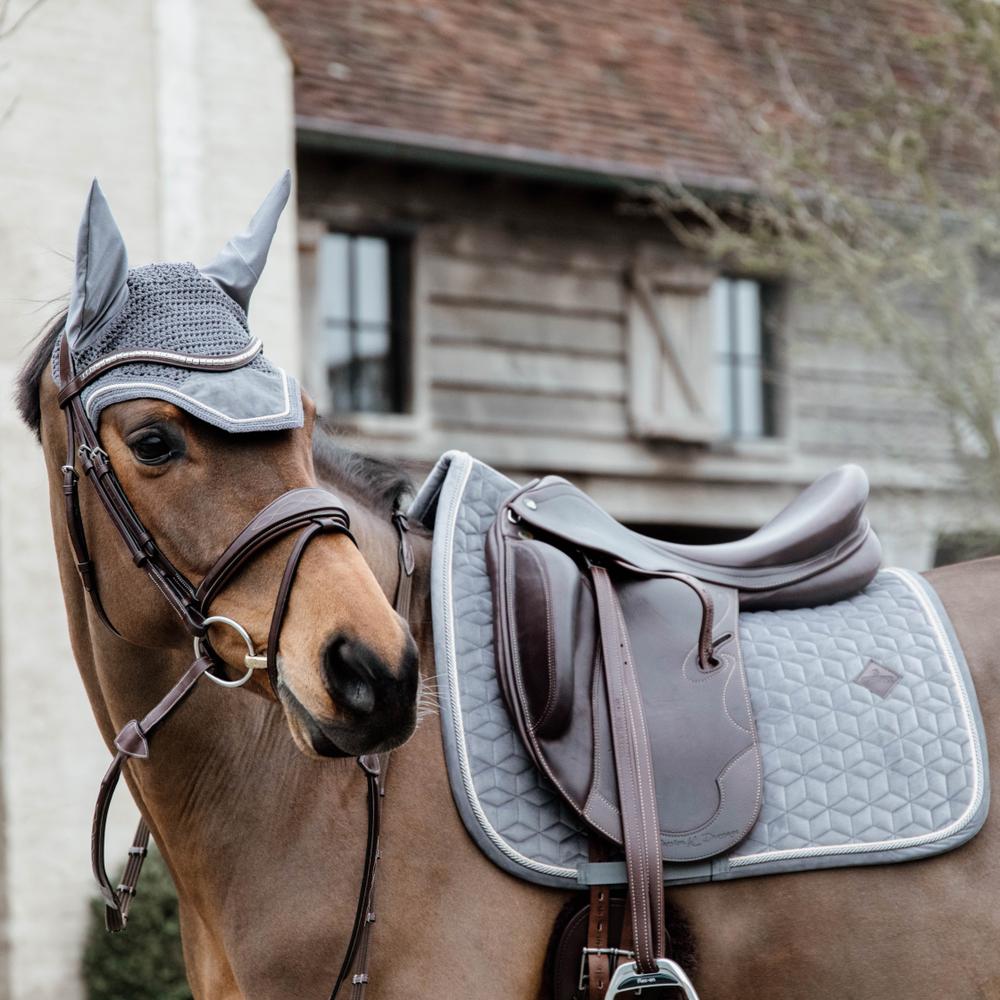Grye saddlepad on a horse under a brown saddle