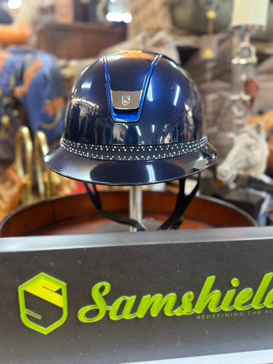 Blue helmet on a stand with Samshield logo in the foreground
