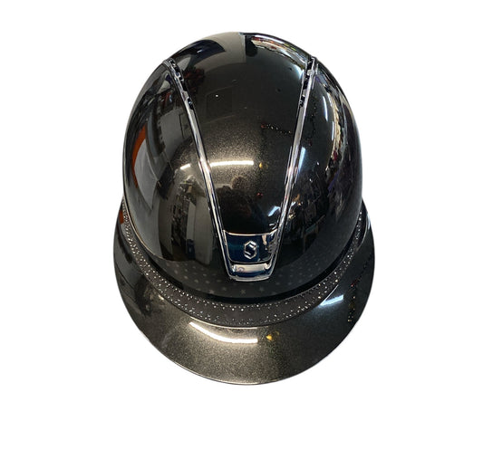 Black riding helmet on a white background