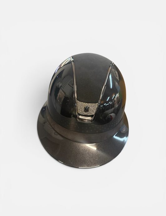 Black glossy helmet on a white background