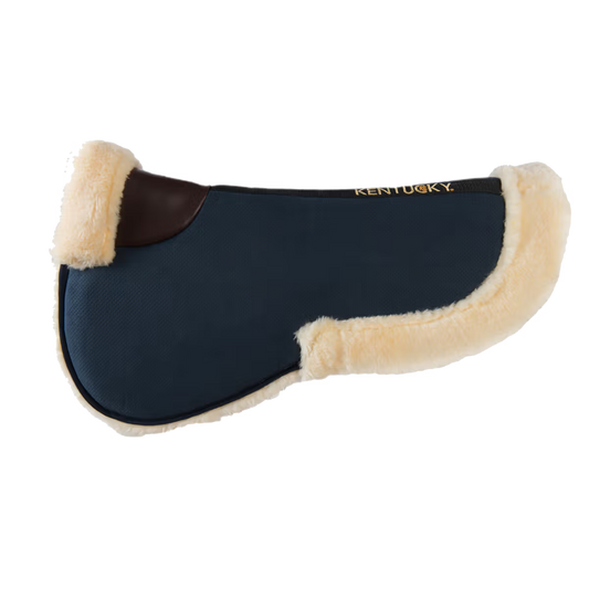 Navy blue saddle pad with beige fleece on a white background