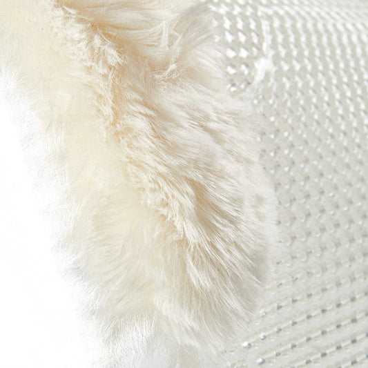 Close-up of a textured white fabric with fluffy surface
