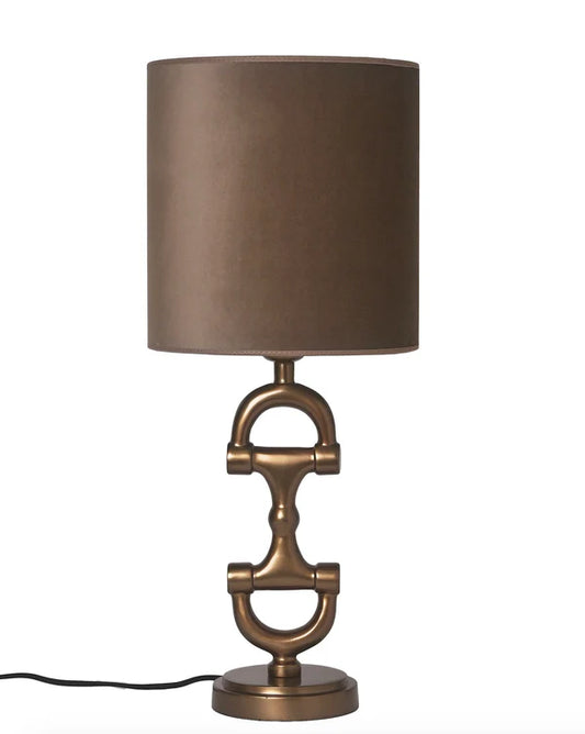 Table lamp with bronze base and brown shade on a white background