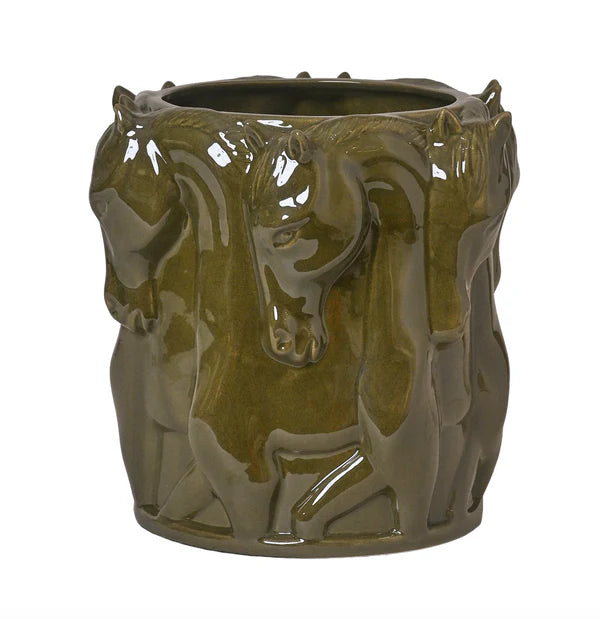 Green ceramic vase with horse designs on a white background