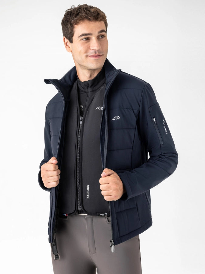 Man wearing a navy softshell jacket with Equiline branding