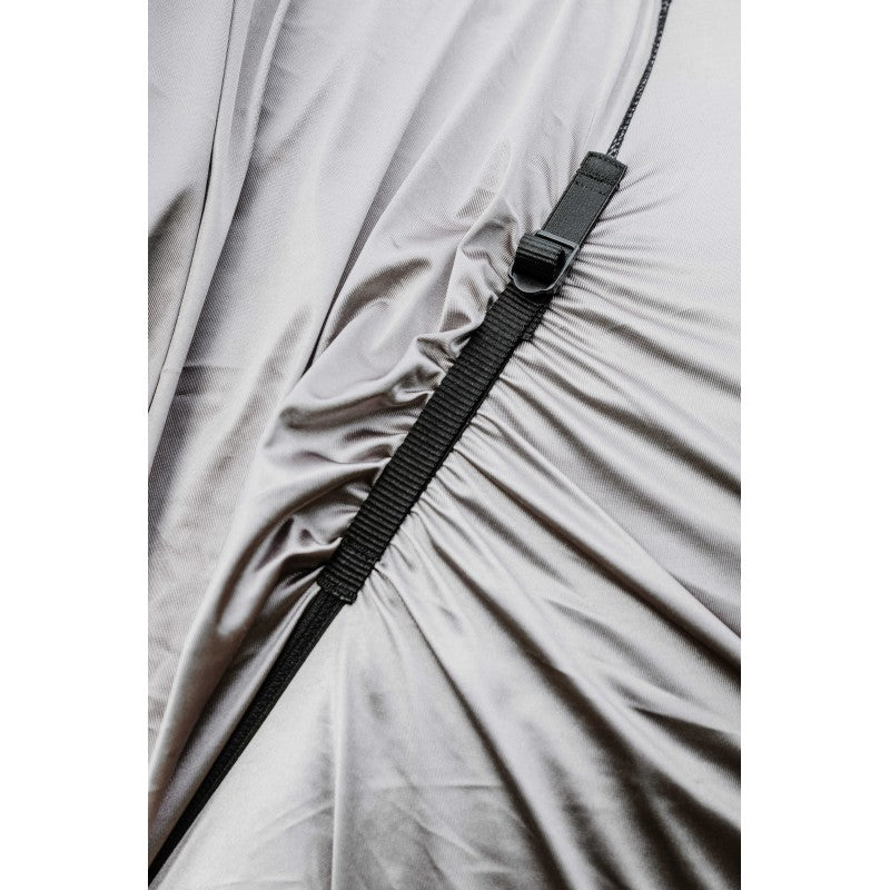 Close-up of a black strap on a gray fabric background