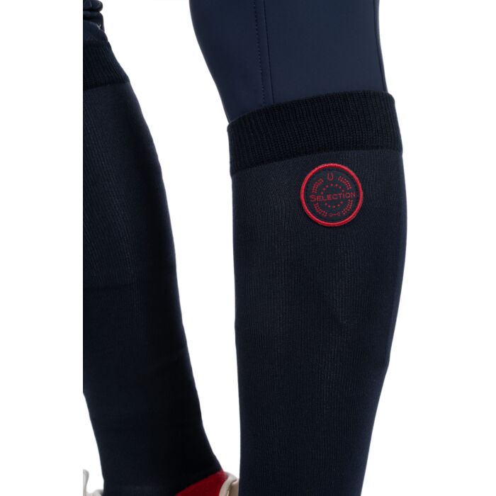 Navy socks with a red logo on a white background