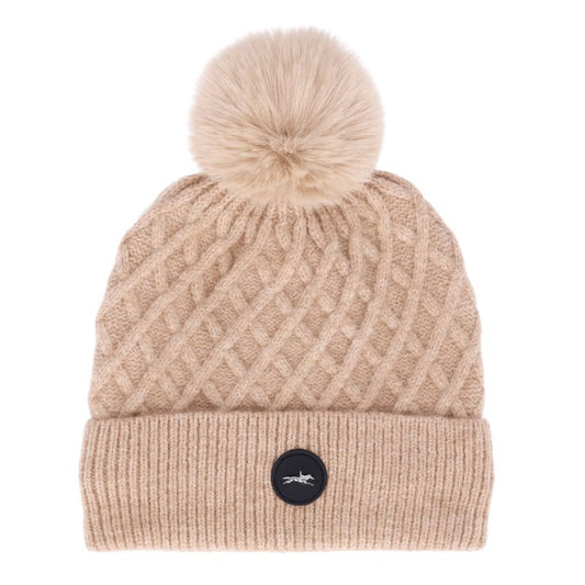 Soft beige knitted woolly hat on a white background