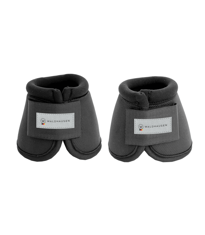 Pair of black horse boots with visible brand label on a white background