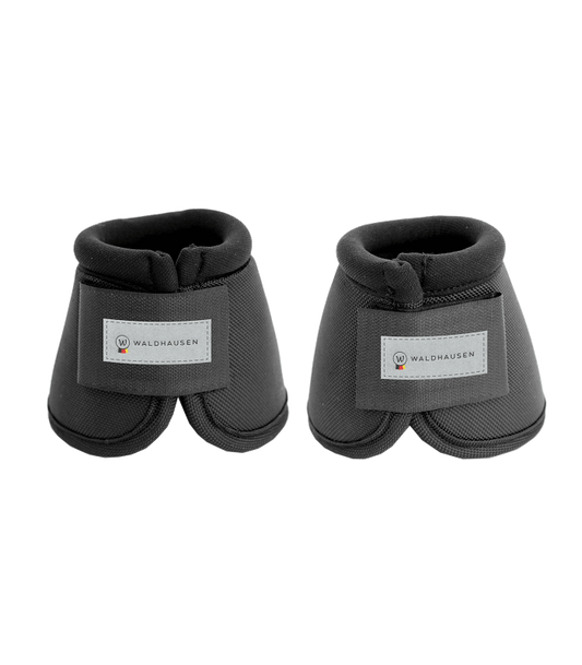 Pair of black horse boots with visible brand label on a white background