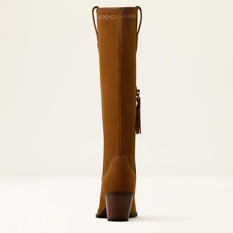 The back of a single knee-high brown boot with a low block heel, and decorative stitching, shown in profile against a clean off-white background.
