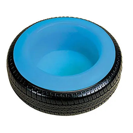 A tire with a blue bowl inside, shown on a plain white background.