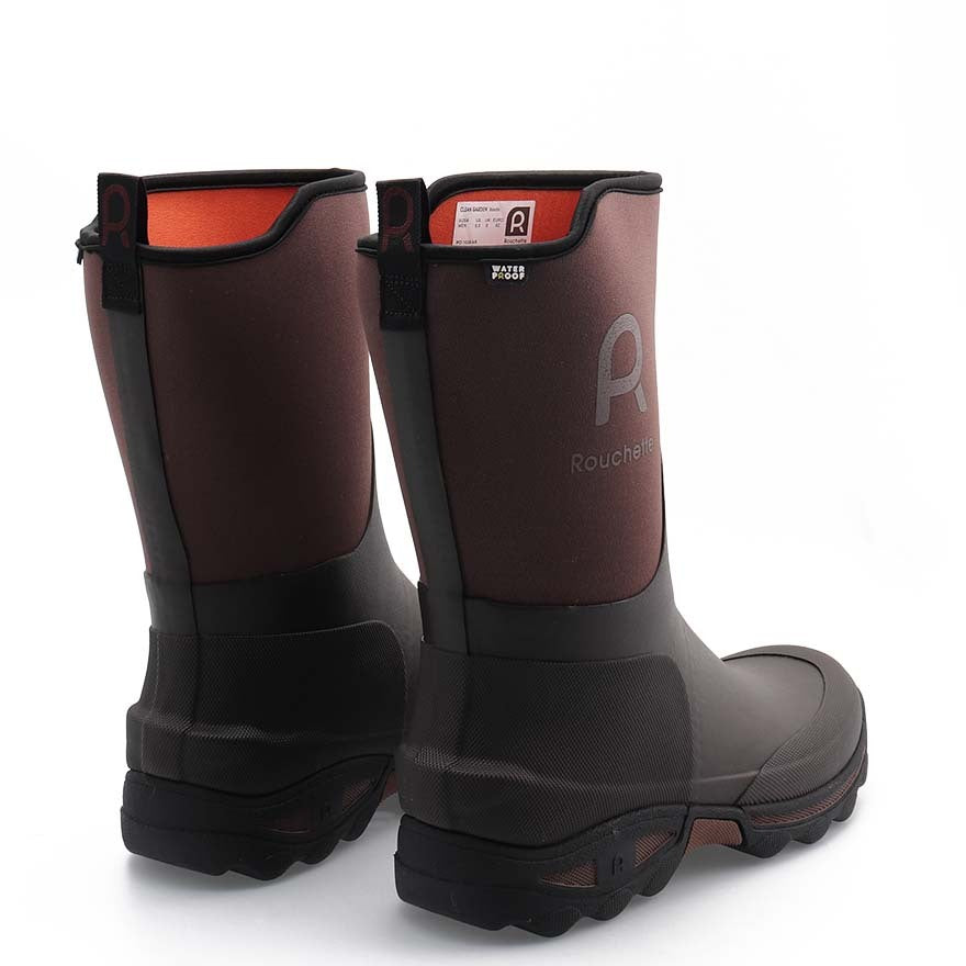 Pair of brown boots on a white background