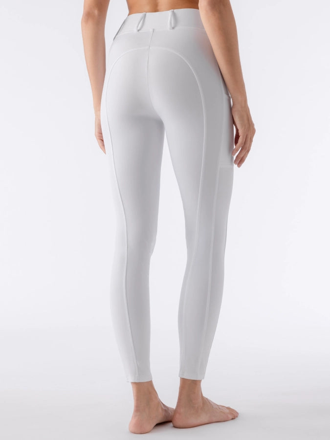 White leggings worn by a person on a white background