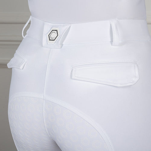 White riding pants with a brand logo on the waistband against a neutral background