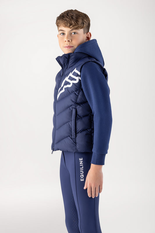 Child wearing a navy blue puffer vest and tracksuit with 'Equiline' branding on a white background