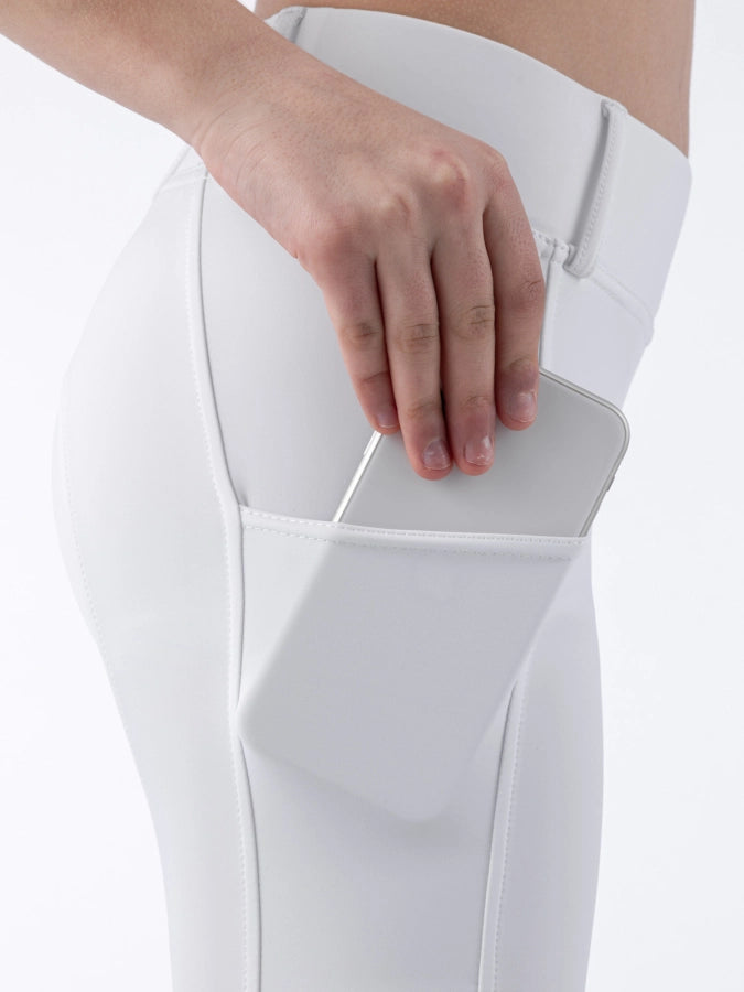White riding tights on a white background