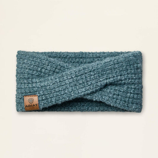 Textured blue headband on a beige background