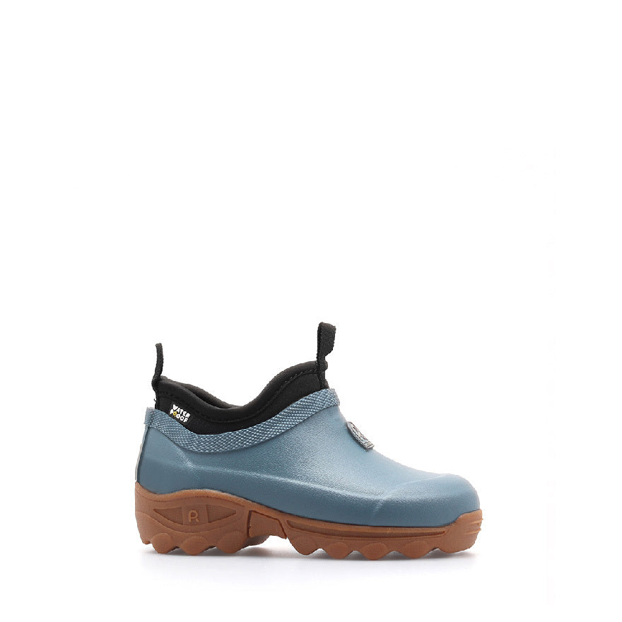 Blue rubber shoe with brown sole on a white background