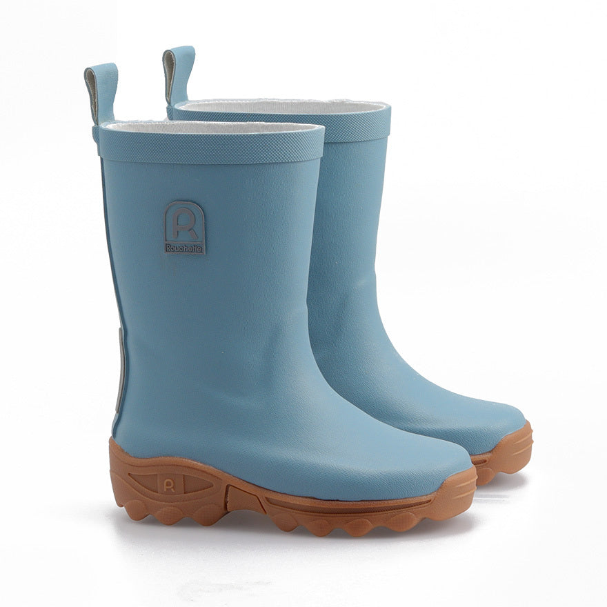 Pair of blue wellies on a white background