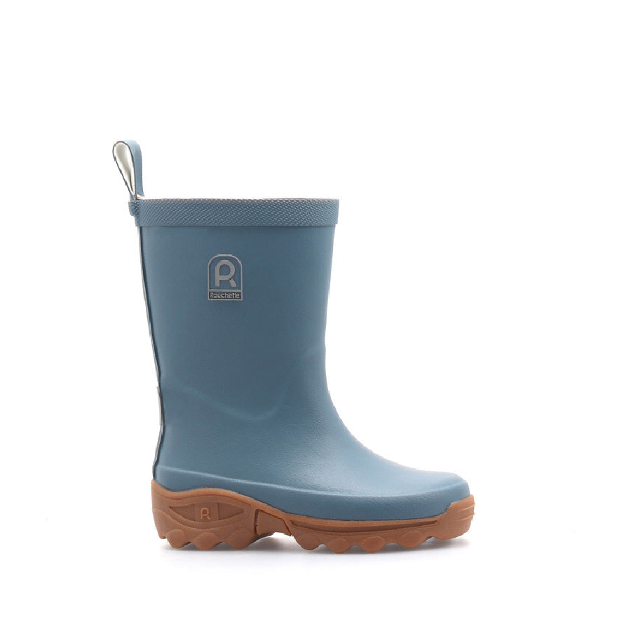 Blue rain boot with brown sole on a white background
