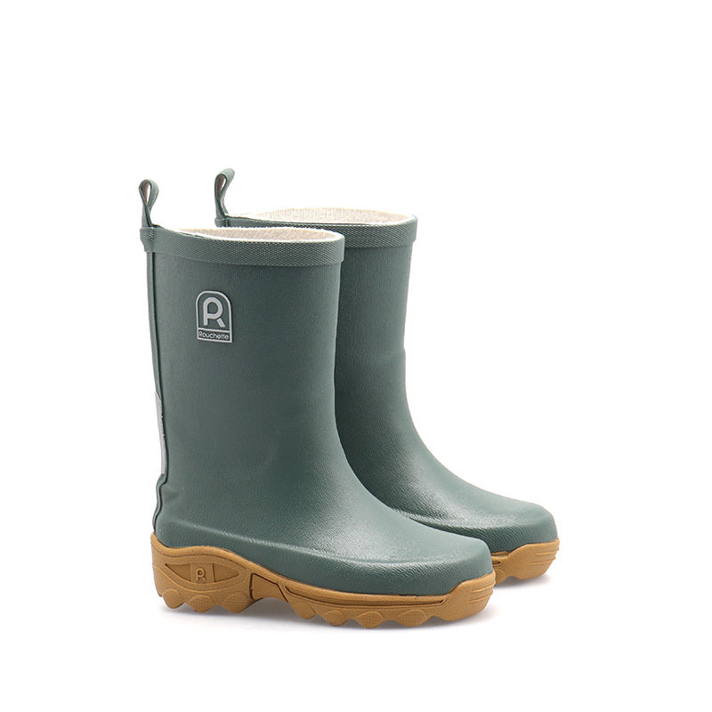 Pair of green rubber boots with brown soles on a white background