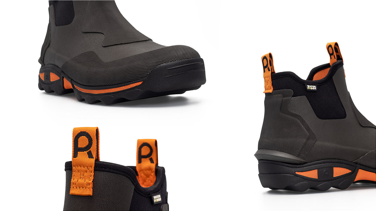 Pair of brown and orange ankle boots on a white background