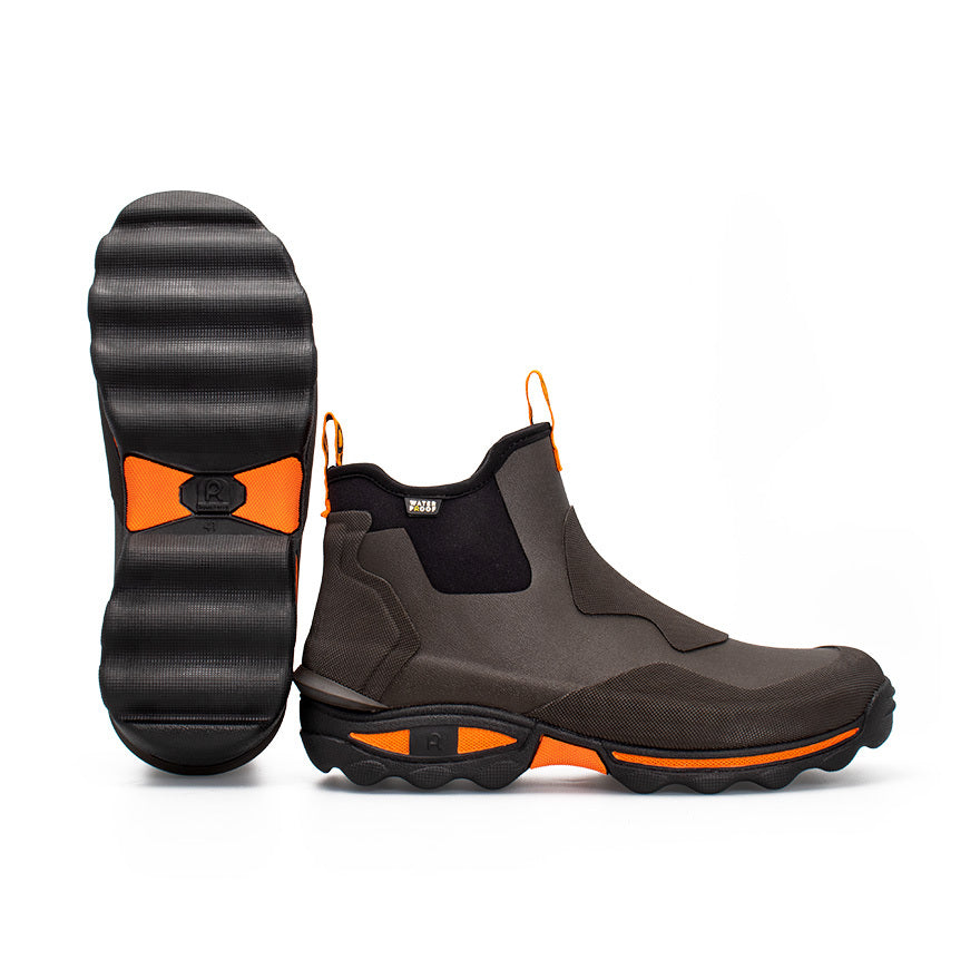 Pair of brown and orange ankle boots on a white background