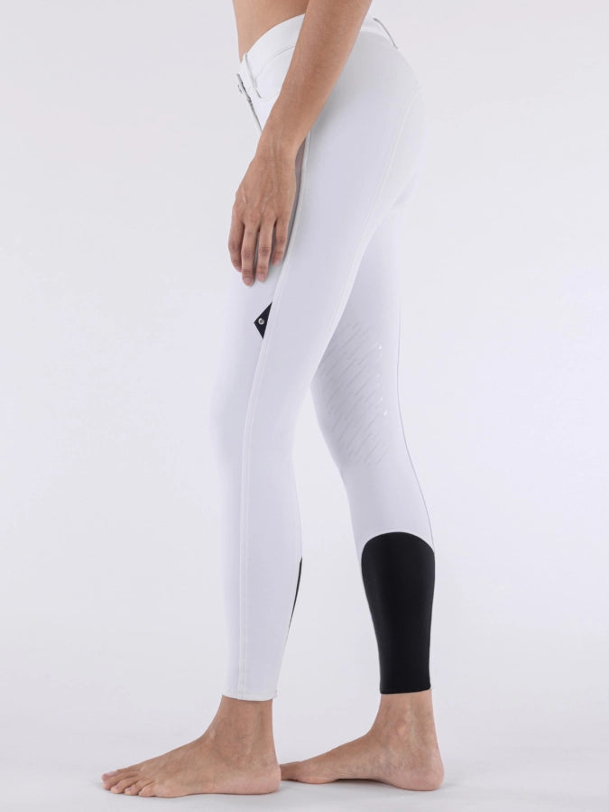 White leggings with a black patch on a white background